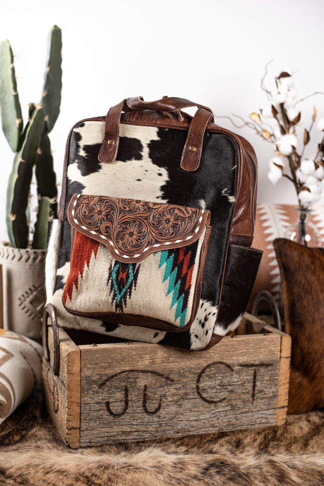 The Kamal Cowhide Backpack Triangle T Boutique